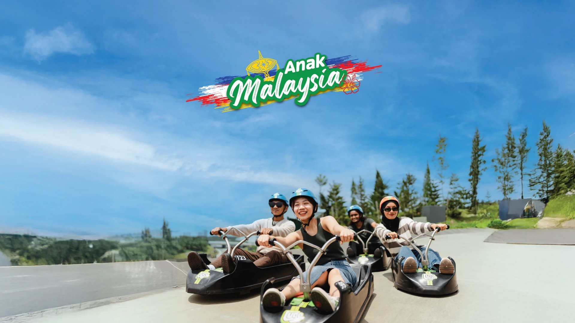 Skyline Luge Kuala Lumpur Anak Malaysia Promo - A group of friends riding the Luge smiling