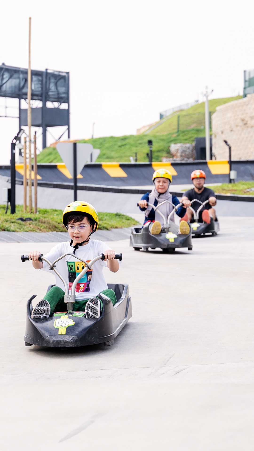 People having fun on the luge